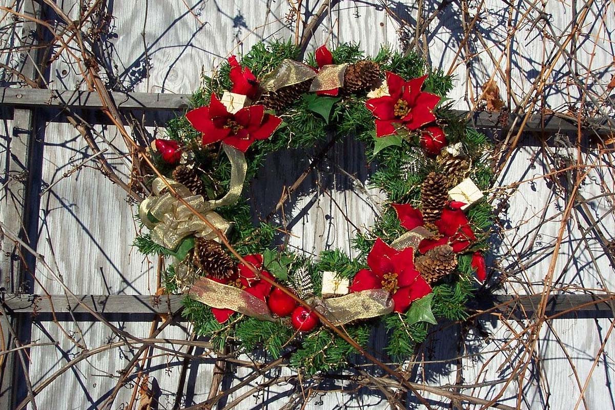 christmas wreath on a fence